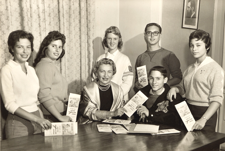 Group with United Red Feather Appeal Campaign promotional material, United Jewish Appeal, Vancouver, B.C., 1950.